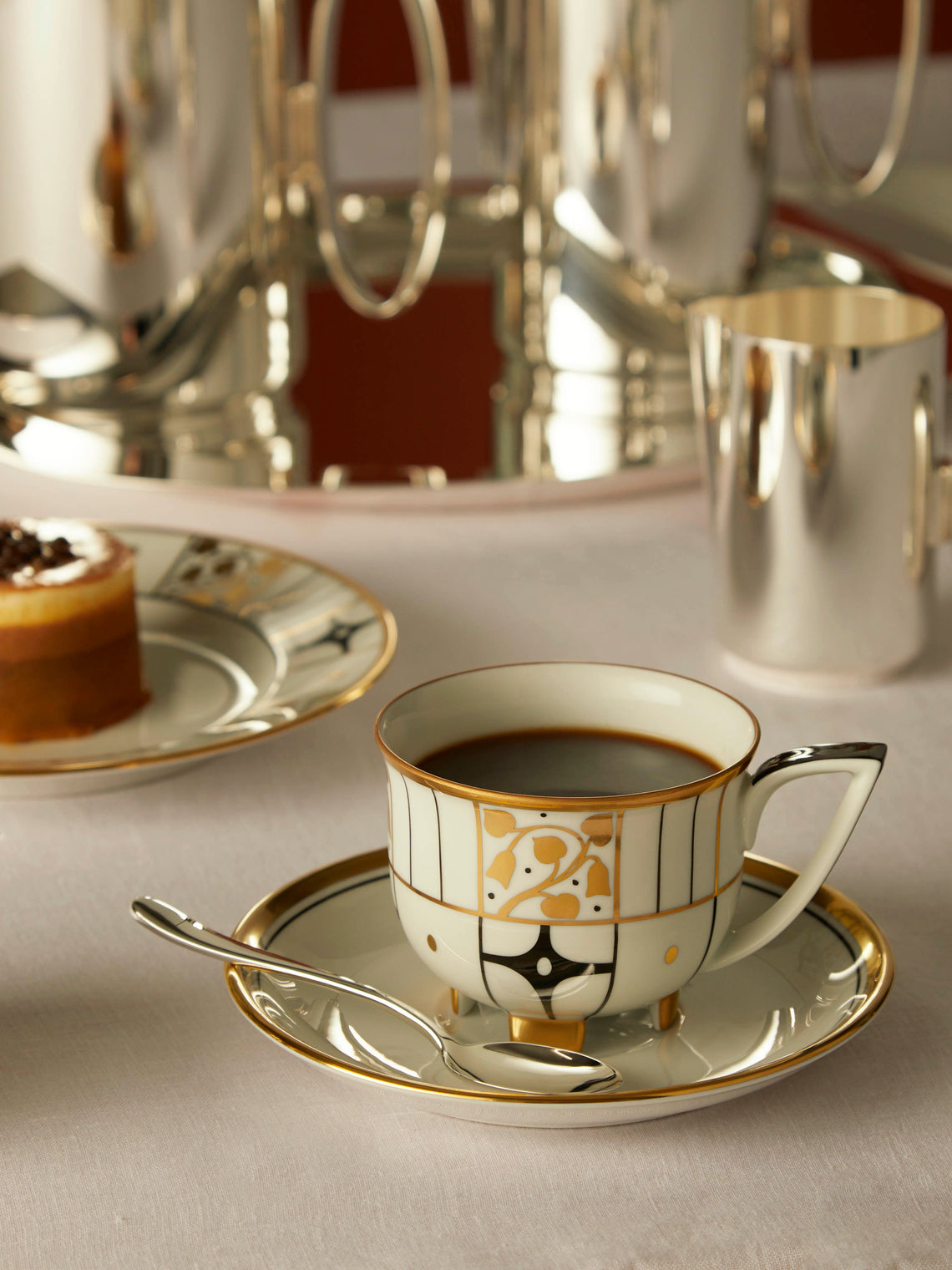 Déco Vienne Hand-Painted Porcelain Coffee Cup and Saucer